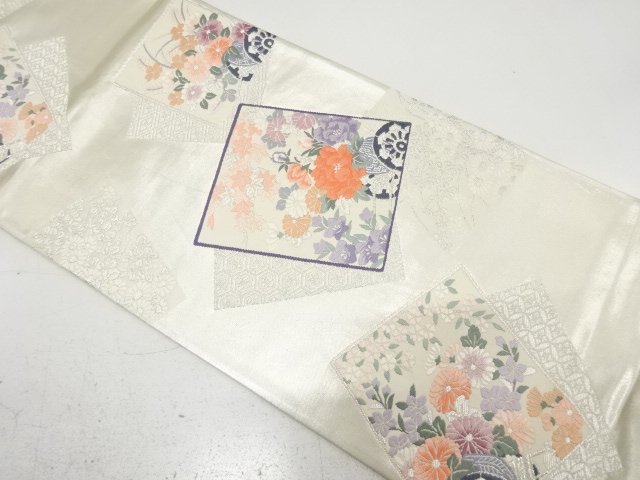 色紙に花車模様織り出し　袋帯